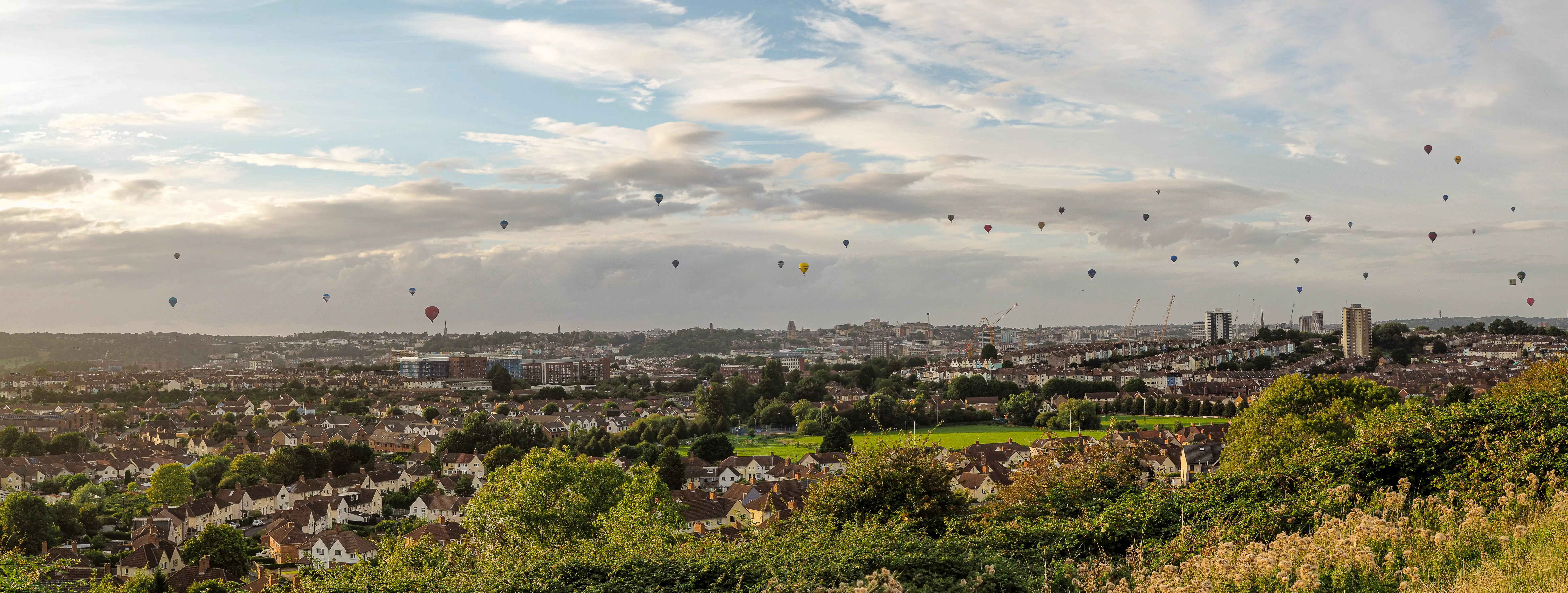 A photo of hot air balloons above Bristol